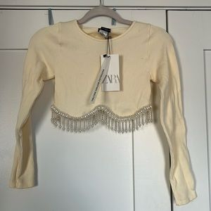 Ivory Zara top with beading detail size x small